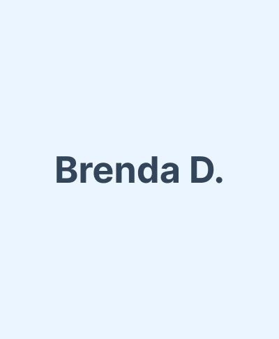 Brenda D., dental professional at Gila Ridge Dental, displayed on light blue background.